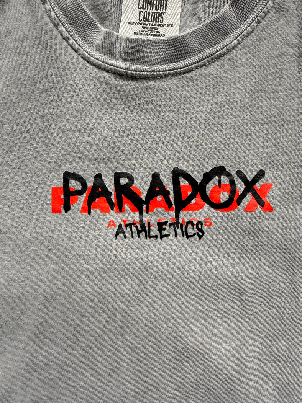 Red Paradox with Paint Splatter Tee